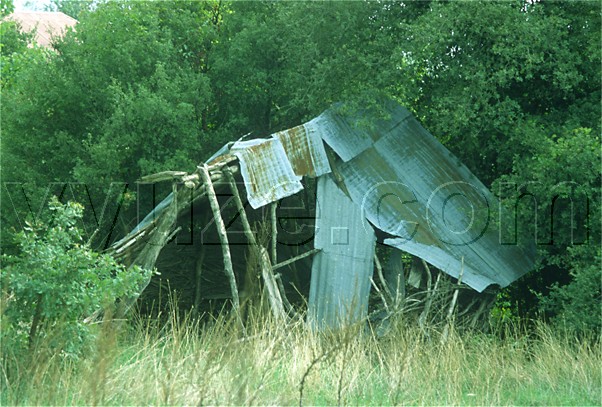 Collapsed corrugated iron roof / Location: Epirus, Greece