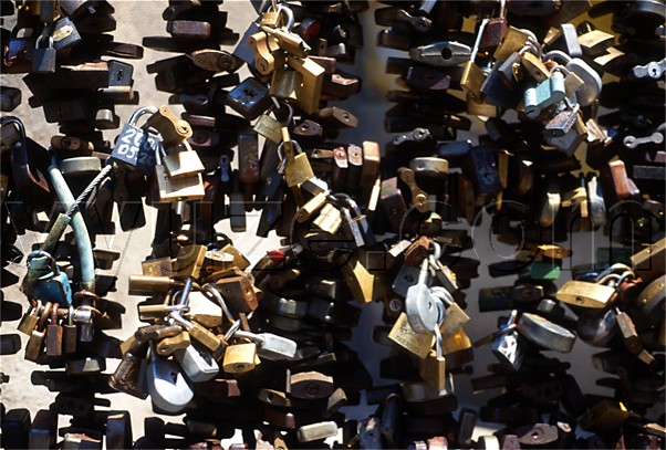 Locks on the railings of the bishop's palace / The tradition is for lovers to put a lock on the railings and throw away the key.  Then they will never part.  Look for the combination lock in some of the images. / Location: Pecs, Hungary