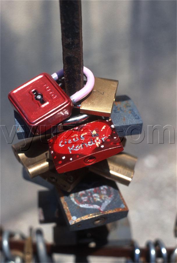 Locks on the railings of the bishop's palace / The tradition is for lovers to put a lock on the railings and throw away the key.  Then they will never part.  Look for the combination lock in some of the images. / Location: Pecs, Hungary