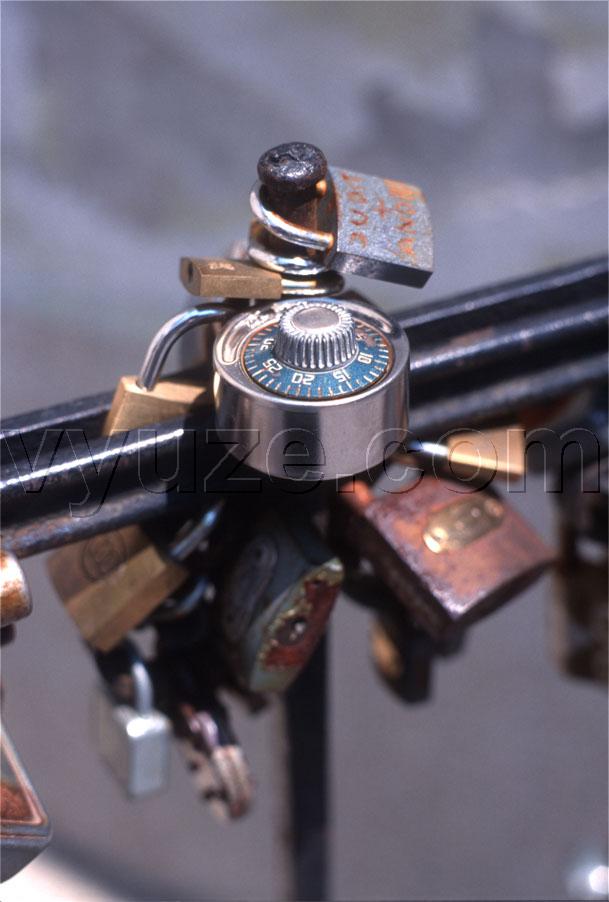 Locks on the railings of the bishop's palace / The tradition is for lovers to put a lock on the railings and throw away the key.  Then they will never part.  Look for the combination lock in some of the images. / Location: Pecs, Hungary