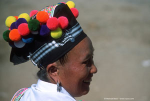 Lao woman in pom-pom hat